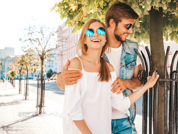 Smiling beautiful girl and her handsome boyfriend.