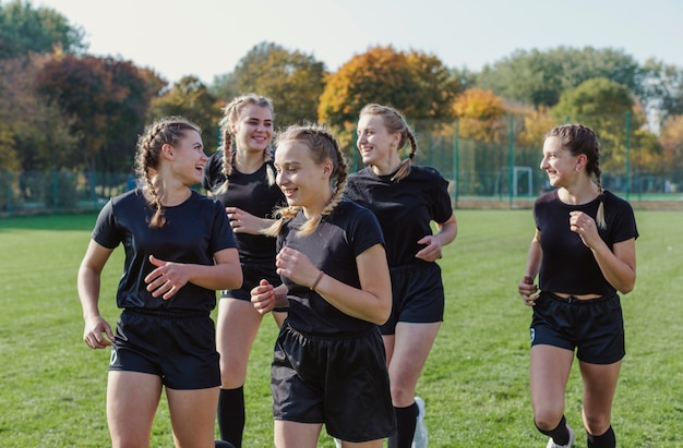 Smiling blonde women running