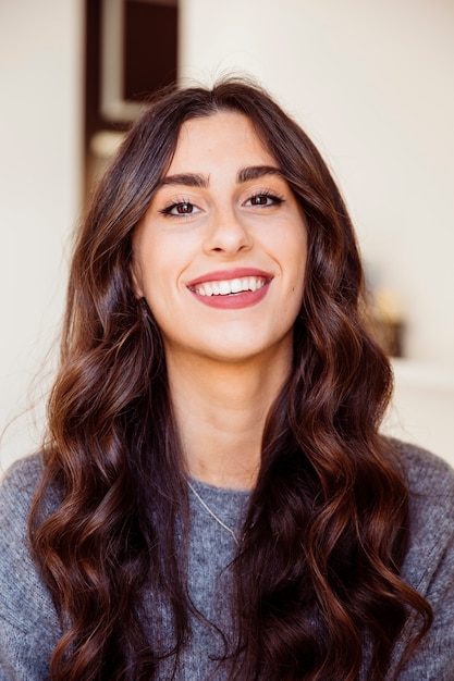 Smiling brunette looking at camera