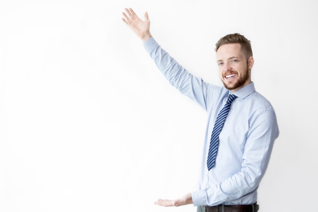 Smiling Business Man Showing Copyspace