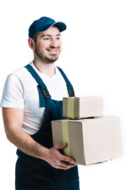 Free photo smiling courier with sealed packages