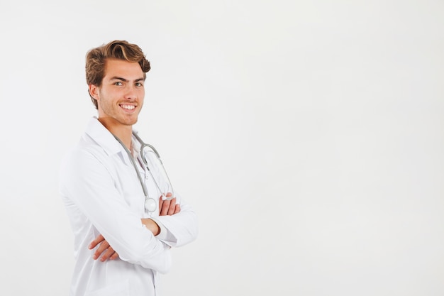 Smiling doctor with arms crossed