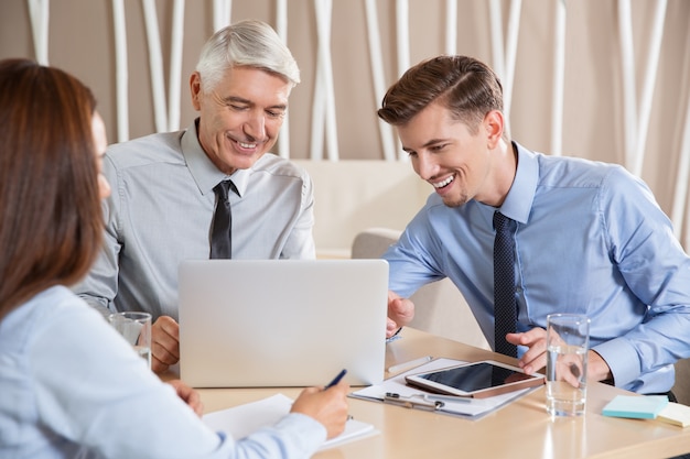 Smiling Enthusiastic Business Team Working