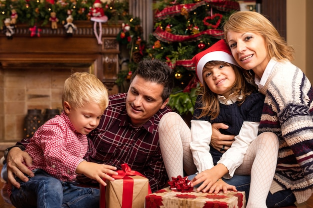 Smiling family with christmas presents