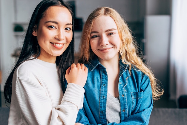 Smiling females looking at camera