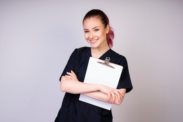 Smiling girl in doctor uniform _