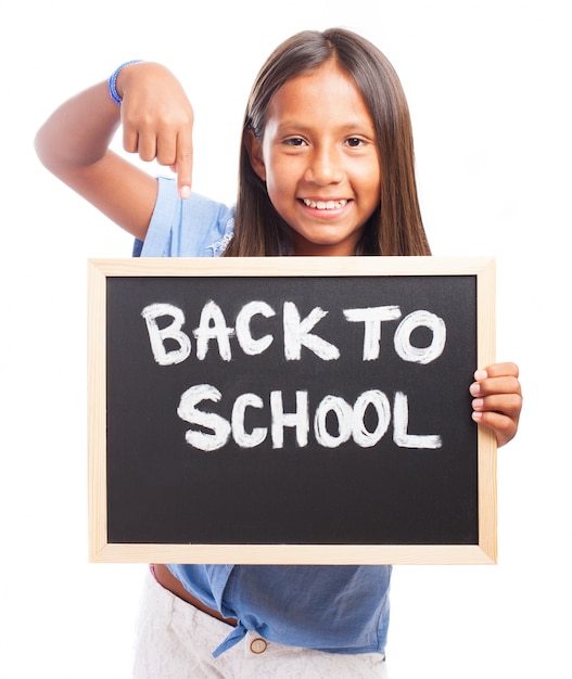 Smiling girl with chalkboard