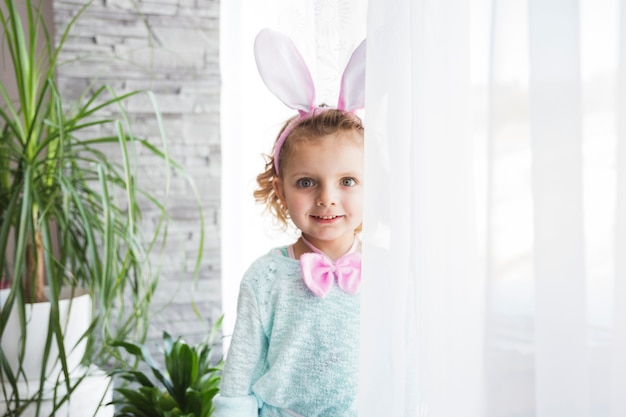 Free photo smiling girl with rabbit ears