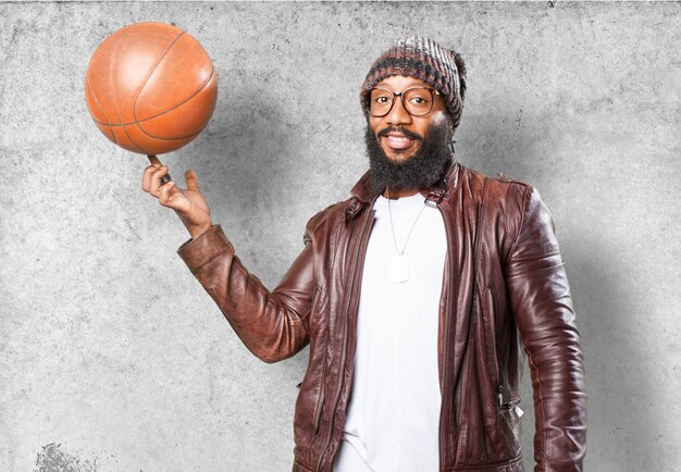 Smiling man with a basketball