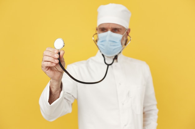 Free photo smiling medical doctor with stethoscope. isolated. coronavirus concept