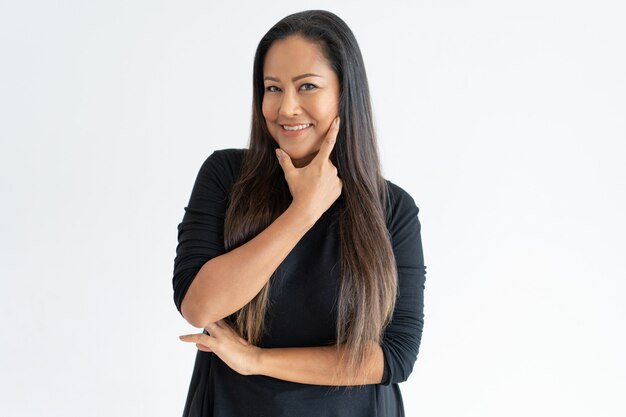 Smiling middle-aged woman looking at camera