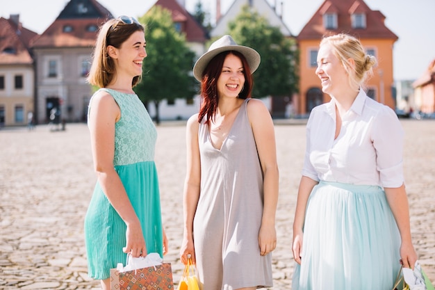 Smiling pretty women on street