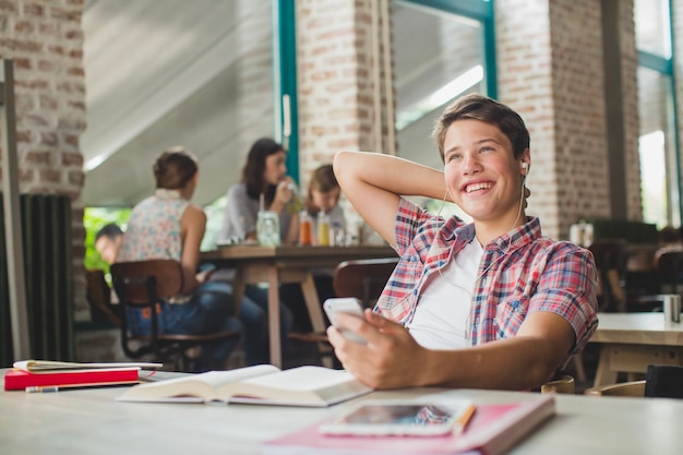 Smiling student in study process