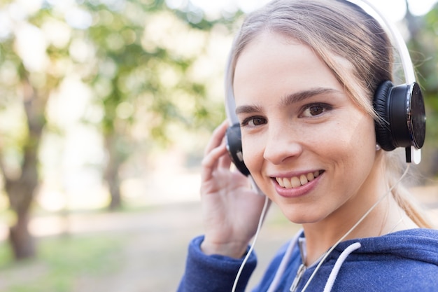 Smiling teen wearing headphones