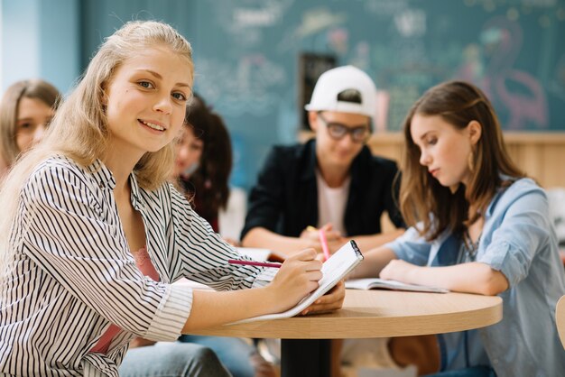 Smiling teenage student girl