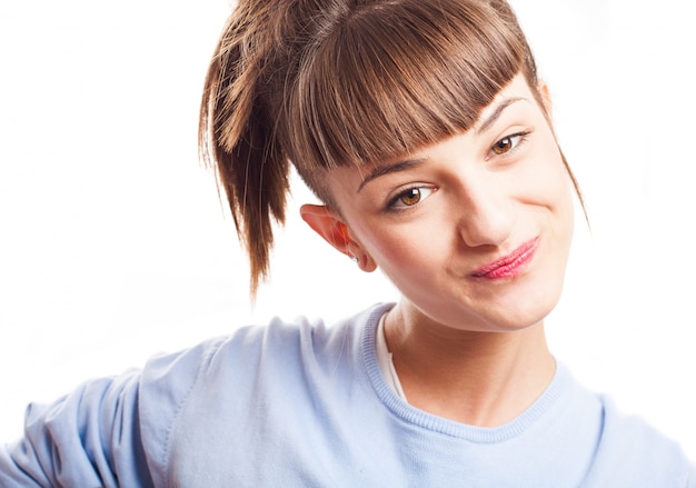 Free photo smiling teenager with fringe and ponytail