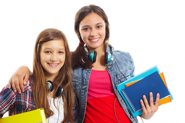 Free Photo smiling teenagers with headphones