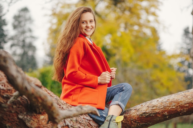 Smiling woman autumn portrait.