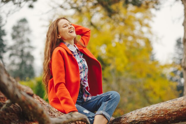 Smiling woman autumn portrait.