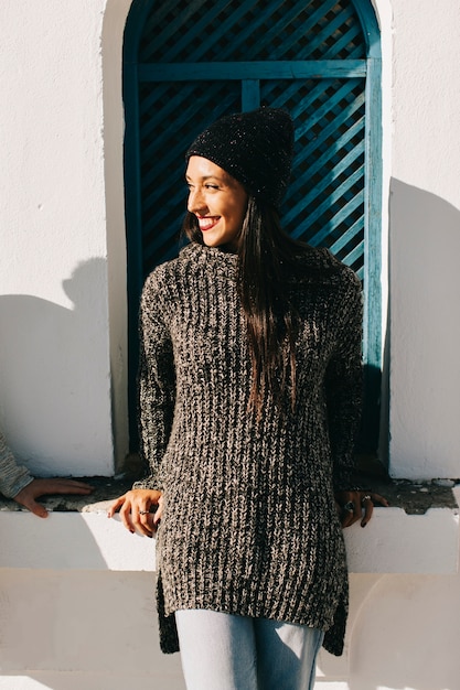 Free Photo smiling woman in front of window