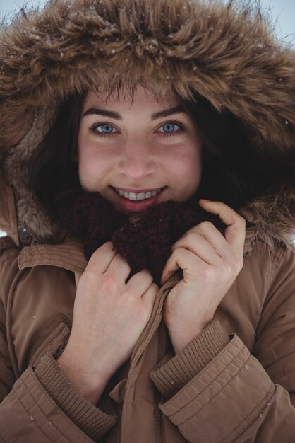 Free Photo smiling woman in fur jacket during winter