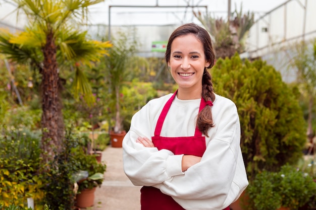 Smiling woman in gardening clothes