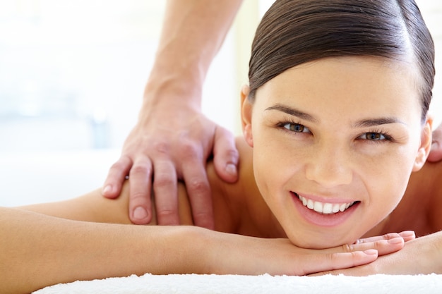 Smiling woman having a massage