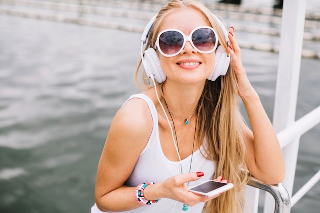 Free Photo smiling woman in headphones