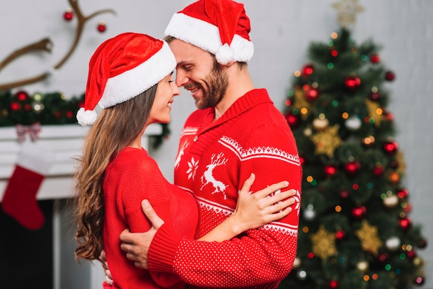 Free photo smiling woman hugging man