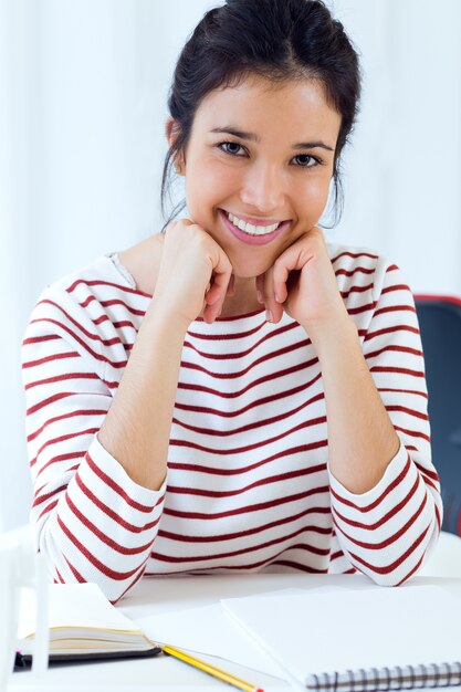 Smiling woman sitting at desk