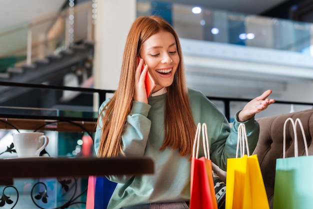 Free Photo smiling woman talking on phone