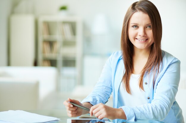 Smiling woman with blue shirt