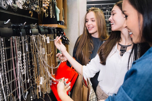 Smiling women posing in bijouterie shop