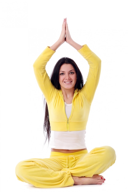 Free photo smiling young girl doing fitness exercise