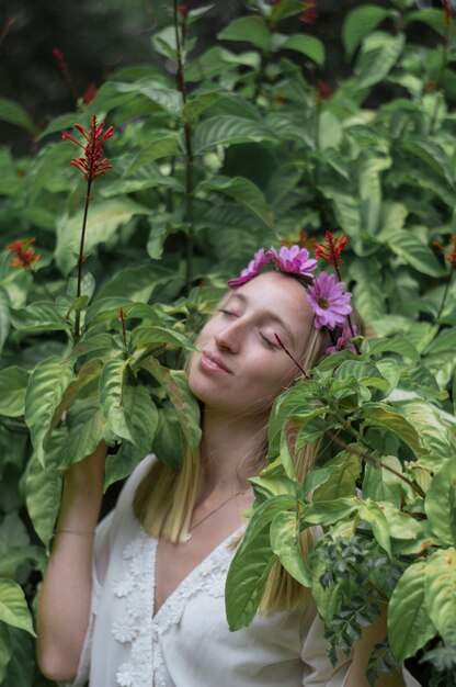 Smiling young woman enjoying outdoors