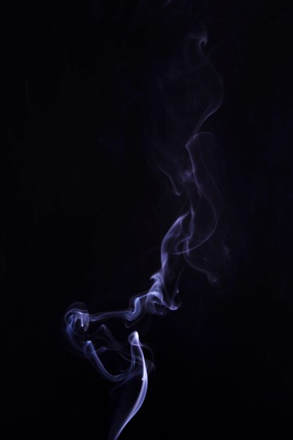 Smoke on the center of the black background