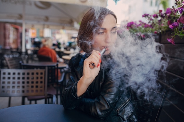 Smoker sitting in a restaurant