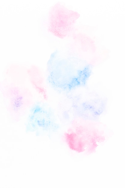 Free photo smooth drops of blue and pink paint