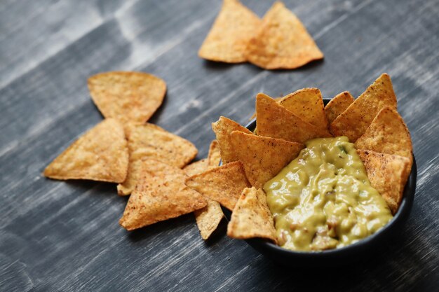 Snacks. Delicious nachos with guacamole