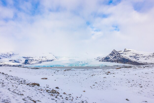 Snow covered mountain Iceland winter season .