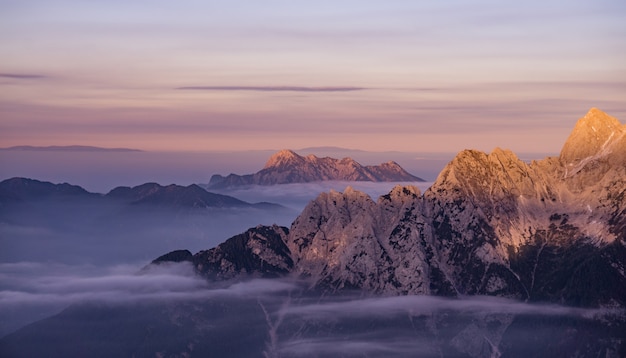 Free photo snow mountains during sunrise