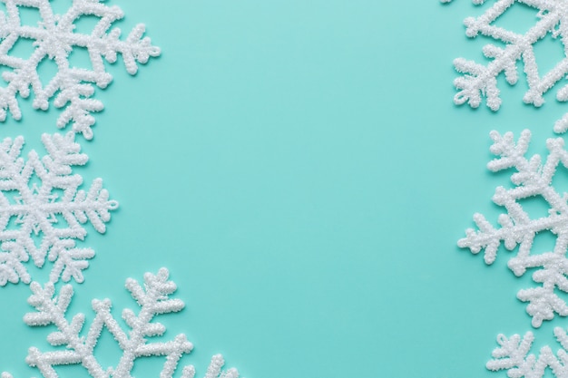 Free photo snowflakes on blue surface