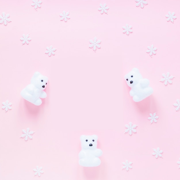 Snowflakes near toy bears