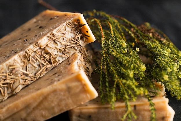 Soap made of basil and basil on table