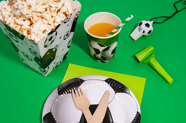 Free Photo soccer birthday with popcorn and drink