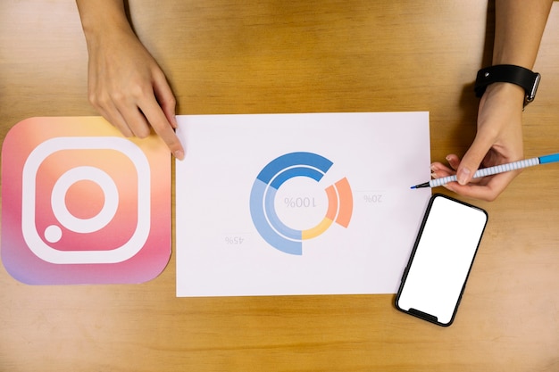 Free Photo social media planner analyzing the instagram application graph