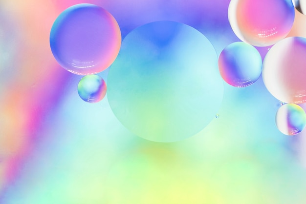 Free Photo soft rainbow abstract background with bubbles