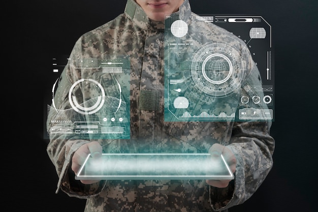 Free photo soldier using virtual tablet hologram army technology