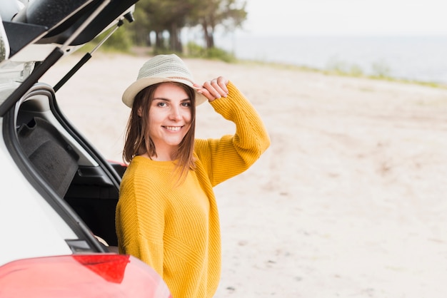 Solo traveling woman looking at camera