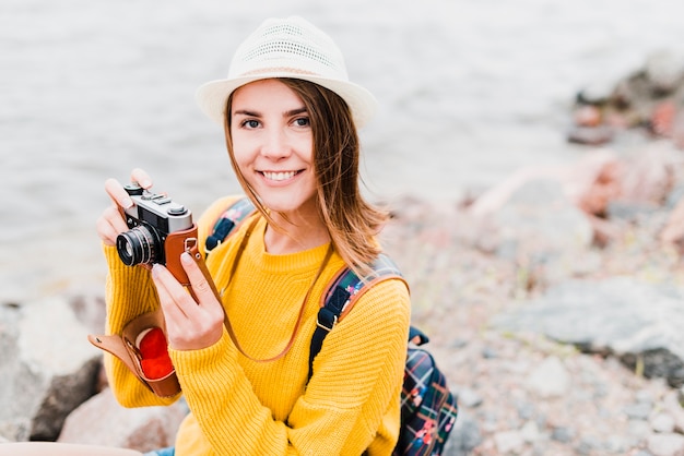 Free Photo solo traveling woman taking photographs